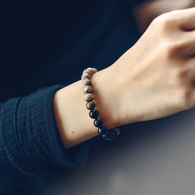 Bracelet de paix en bois d'ébène et obsidienne 15 cm unisexe