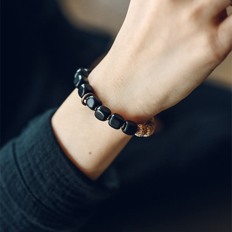 Bracelet de paix en bois d'ébène et obsidienne 15 cm unisexe