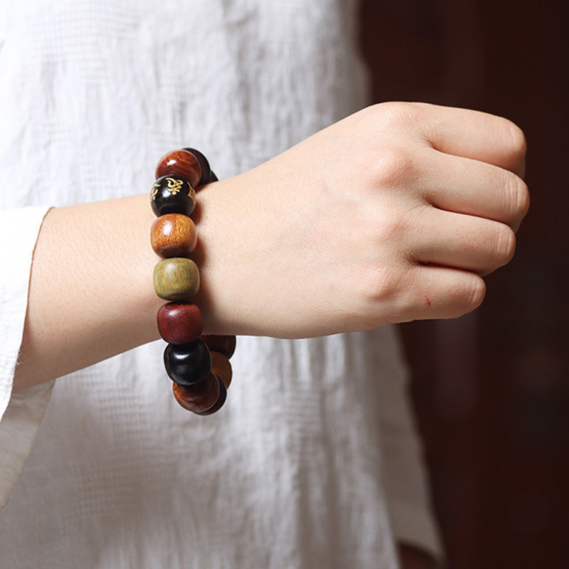 Bracelet Pureté Om Mani Padme Hum en bois d'ébène 14 mm