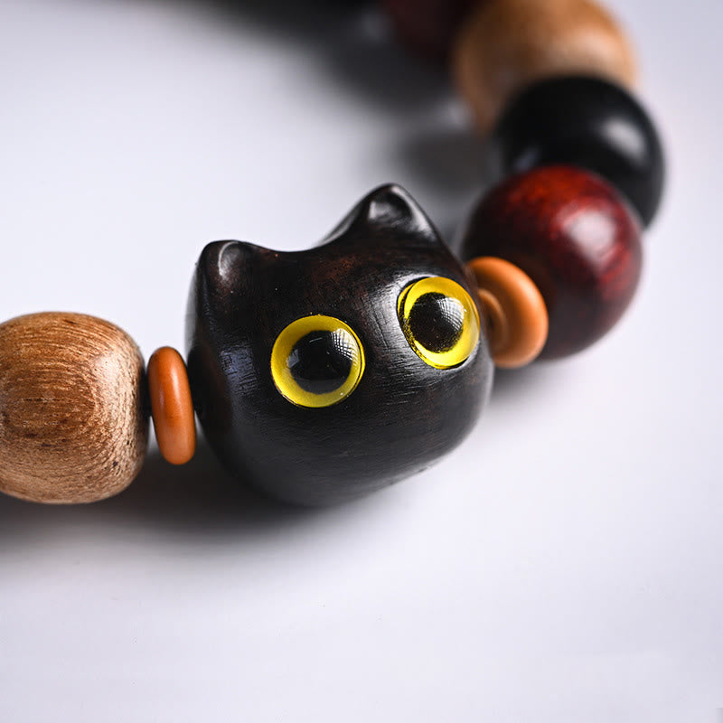 Bracelet de protection en bois d'ébène avec breloque chat en bois de santal rouge à petites feuilles