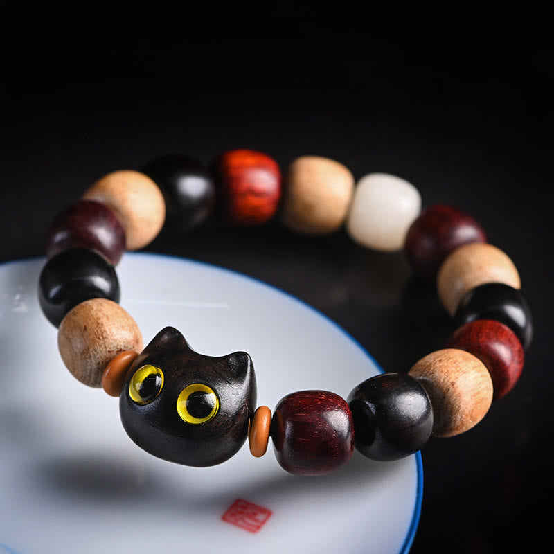 Bracelet de protection en bois d'ébène avec breloque chat en bois de santal rouge à petites feuilles