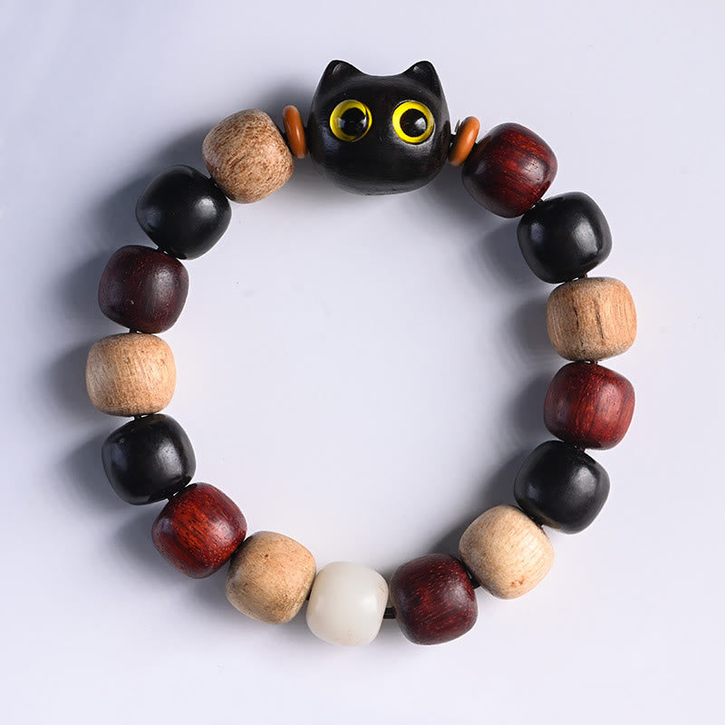 Bracelet de protection en bois d'ébène avec breloque chat en bois de santal rouge à petites feuilles