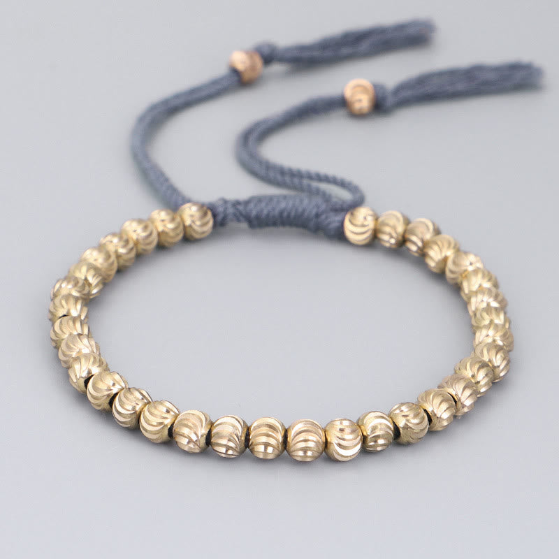 Bracelet spirituel tibétain en perles de cuivre pour la chance et l'équilibre