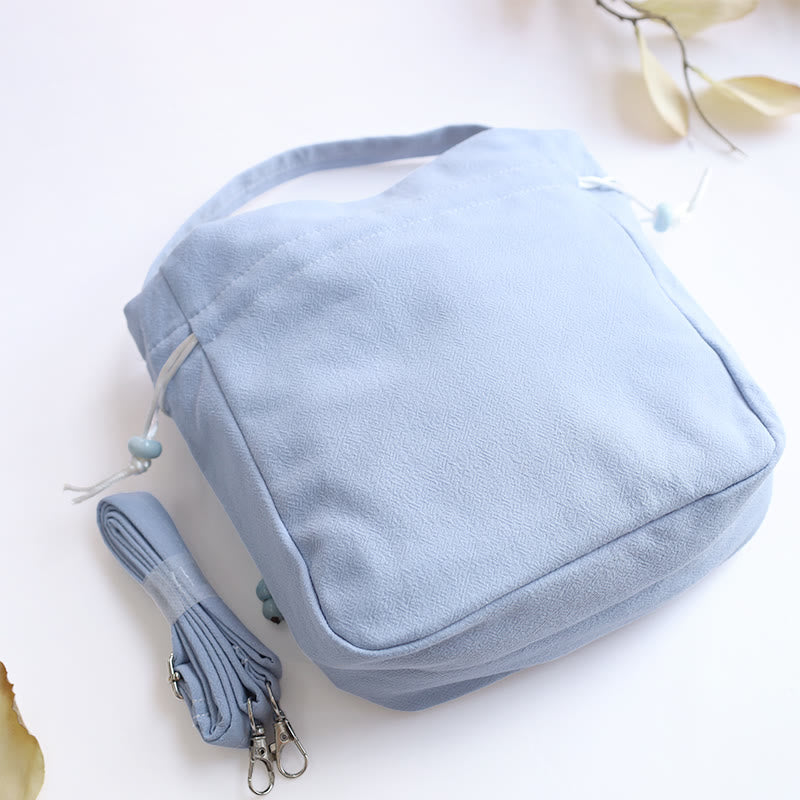 Sac fourre-tout en coton et lin brodé motif papillon et lotus 20 cm