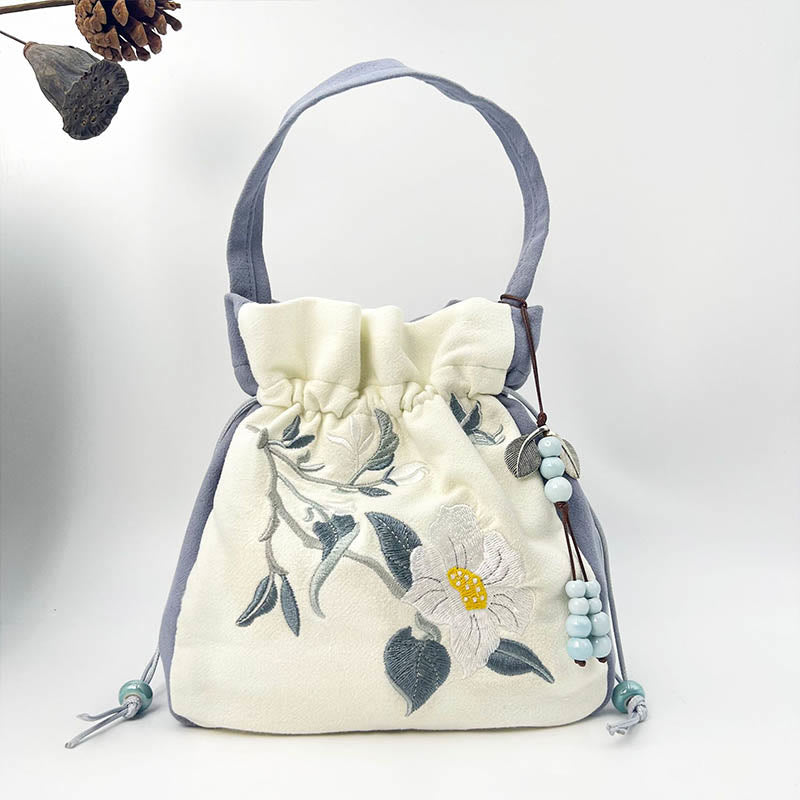 Sac fourre-tout en coton et lin brodé motif papillon et lotus 20 cm