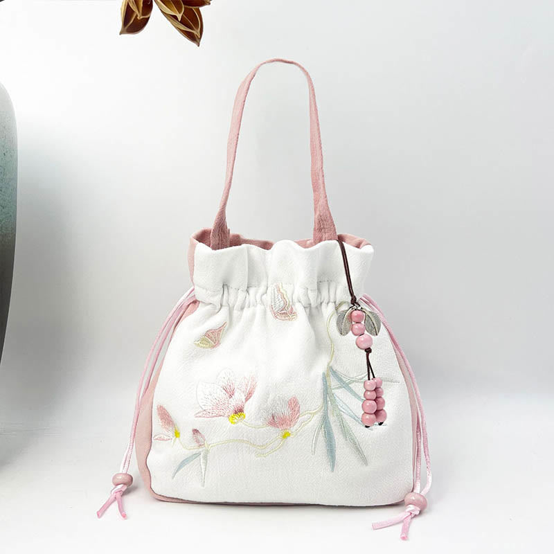 Sac fourre-tout en coton et lin brodé motif papillon et lotus 20 cm