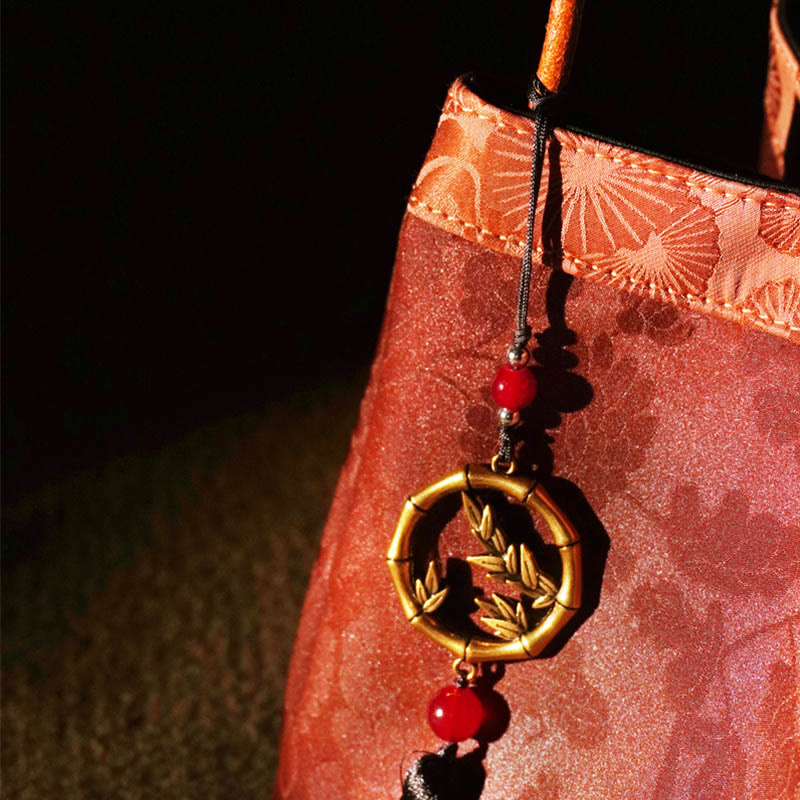 Sac à bandoulière en soie Xiangyunsha brodé avec fleurs de bambou et de prunier