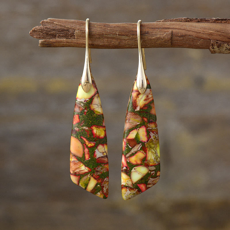 Boucles d'oreilles en pierre de l'empereur pour l'équilibre et la sérénité