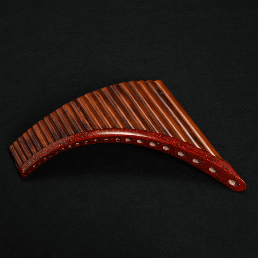 Curved reddish-brown wooden pan flute with multiple pipes - Expert Hand Painted Pan Flute