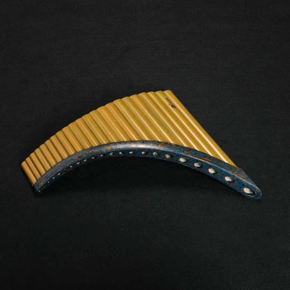 Curved wooden pan flute with blue-painted base and bamboo pipes for expert musicians