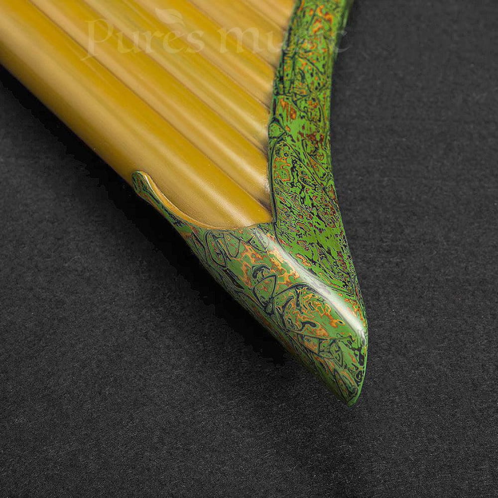 Yellow pencil with ornate green decorative tip in Expert Hand Painted Pan Flute