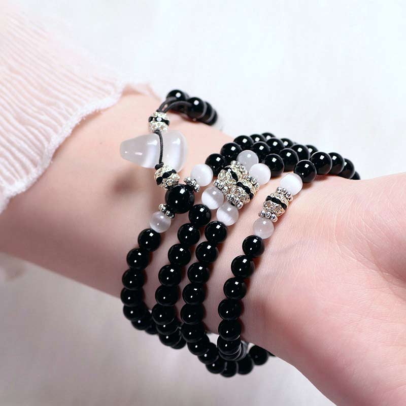 Bracelet de méditation en onyx noir et quartz clair de 6 mm