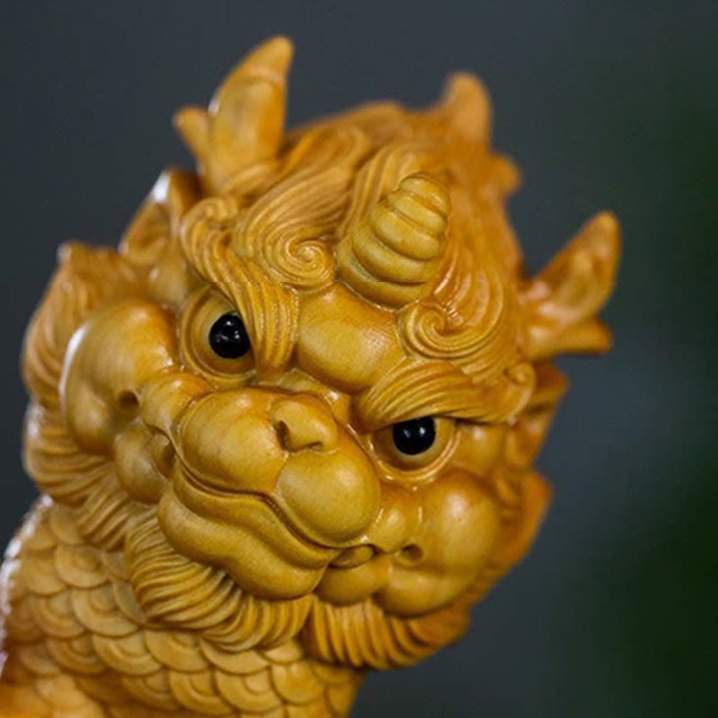Statue spirituelle Feng Shui Kirin en buis gravé