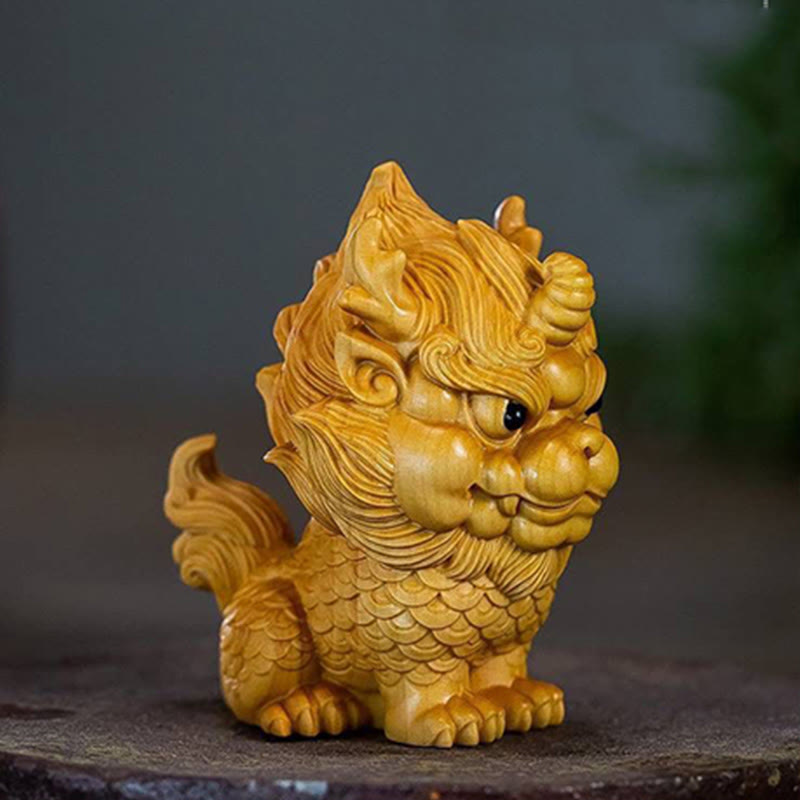 Statue spirituelle Feng Shui Kirin en buis gravé