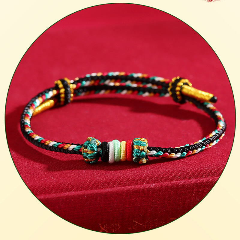 Bracelet porte-bonheur en fil coloré Five Elements pour l'équilibre spirituel