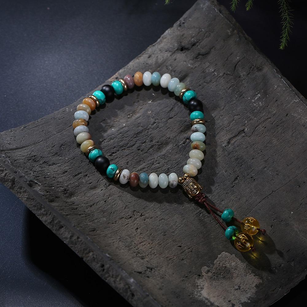 Bracelet Mala en pierre de lapis-lazuli naturelle plate avec pompon mantra à 6 syllabes et breloque tête de Bouddha