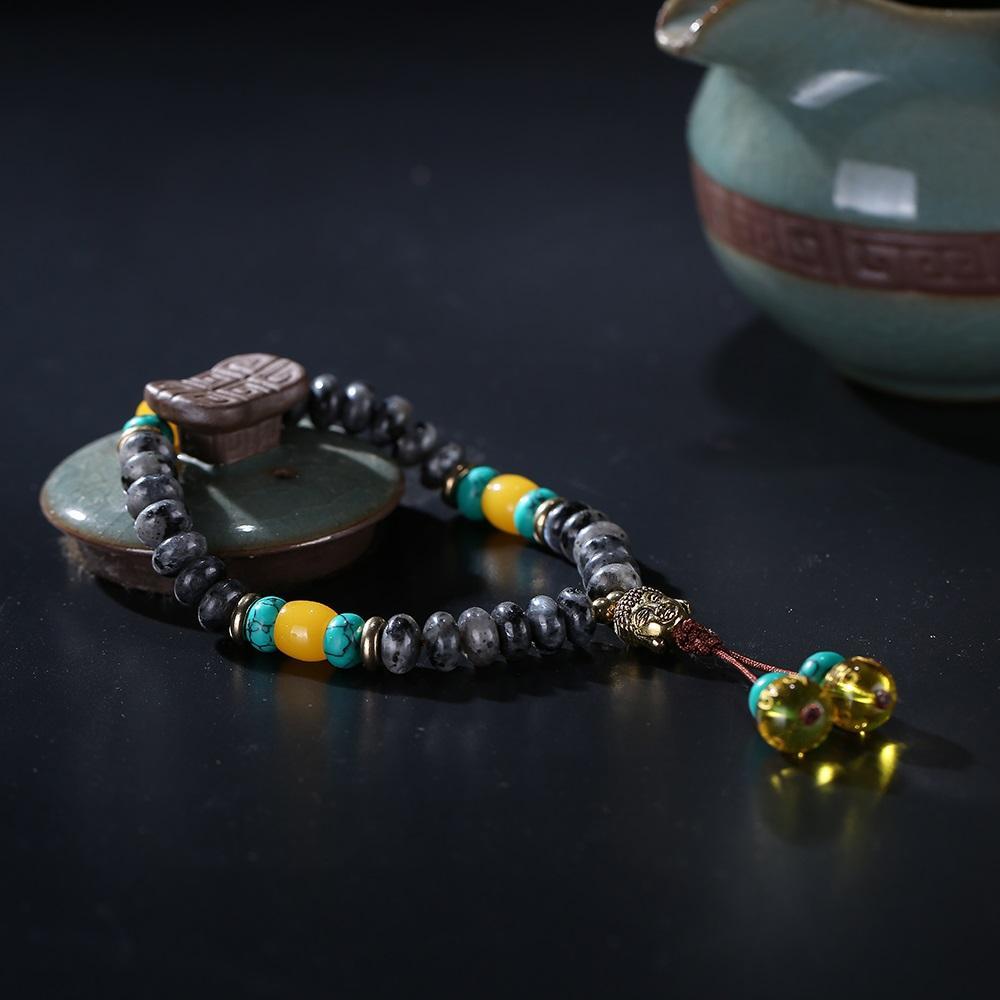 Bracelet Mala en pierre de lapis-lazuli naturelle plate avec pompon mantra à 6 syllabes et breloque tête de Bouddha