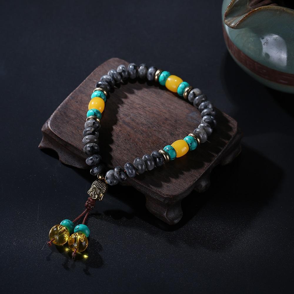 Bracelet Mala en pierre de lapis-lazuli naturelle plate avec pompon mantra à 6 syllabes et breloque tête de Bouddha