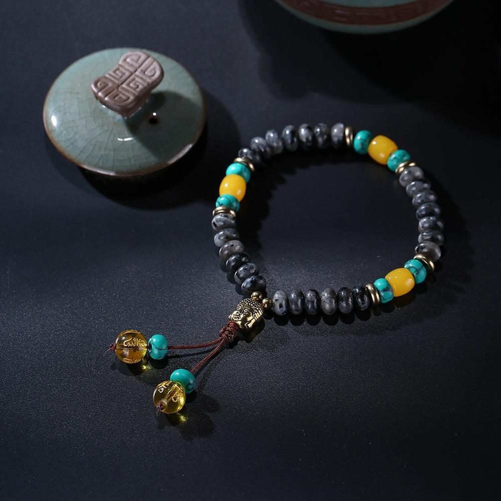 Bracelet Mala en pierre de lapis-lazuli naturelle plate avec pompon mantra à 6 syllabes et breloque tête de Bouddha