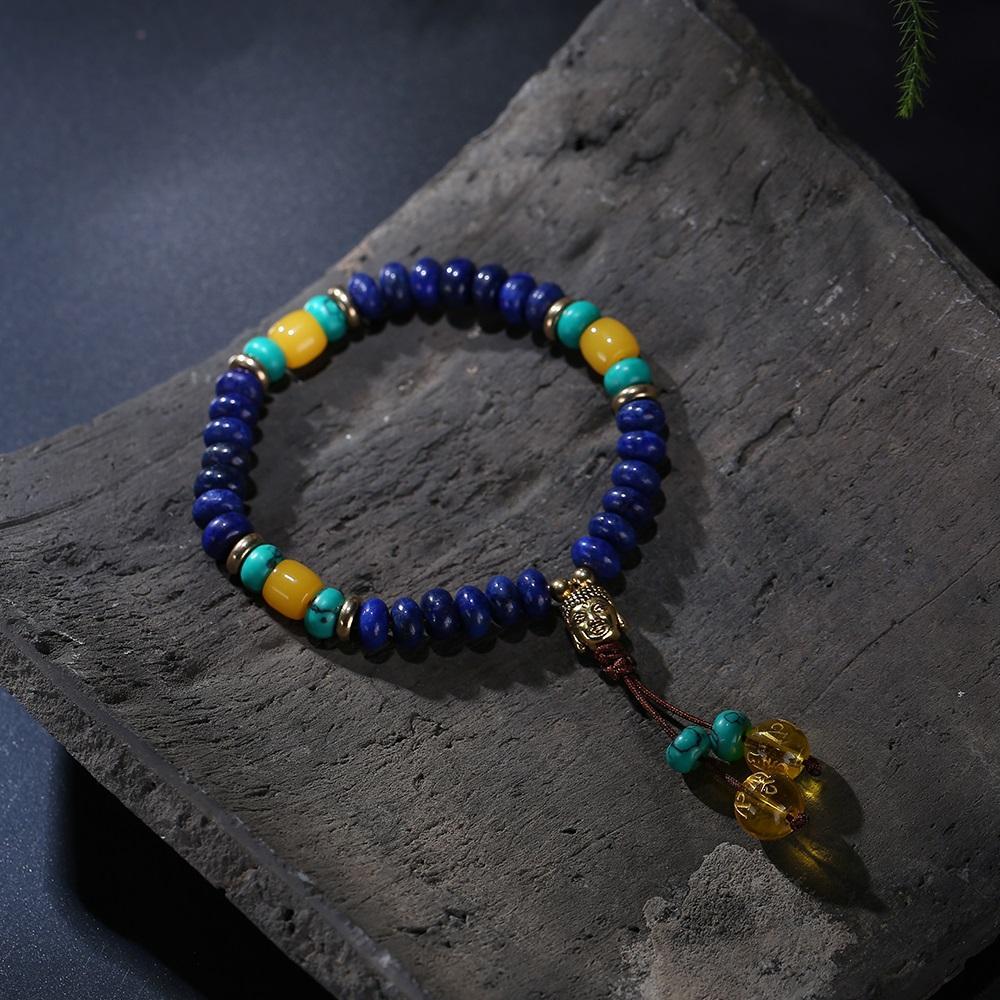 Bracelet Mala en pierre de lapis-lazuli naturelle plate avec pompon mantra à 6 syllabes et breloque tête de Bouddha