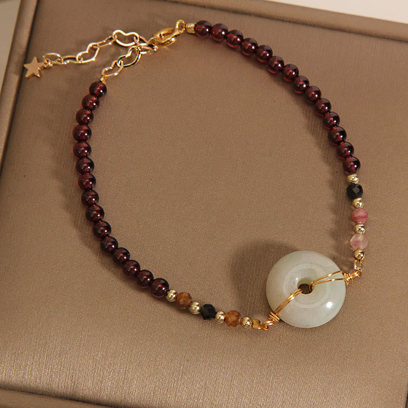 Bracelet de protection avec boucle de paix en jade grenat