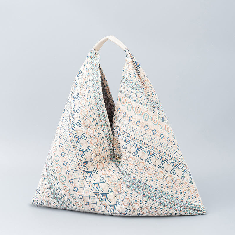 Sac à bandoulière triangulaire à imprimé léopard et fleurs de tigre géométriques
