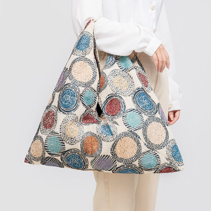 Sac à bandoulière triangulaire à imprimé léopard et fleurs de tigre géométriques