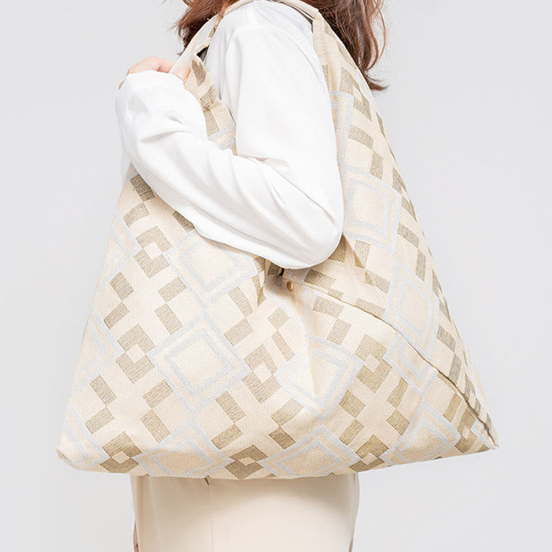 Sac à bandoulière triangulaire à imprimé léopard et fleurs de tigre géométriques