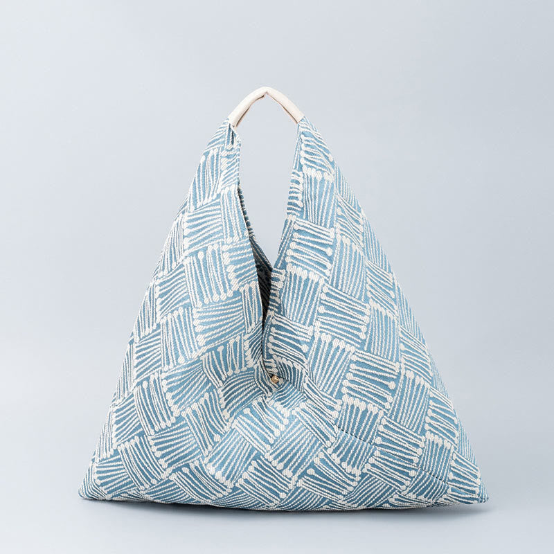 Sac à bandoulière triangulaire à imprimé léopard et fleurs de tigre géométriques