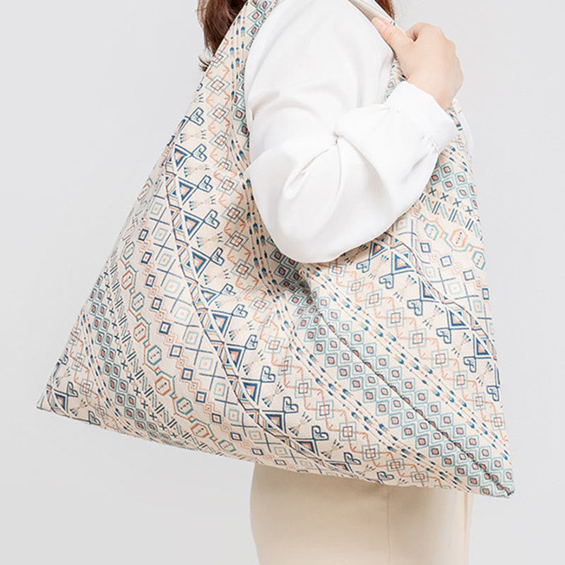 Sac à bandoulière triangulaire à imprimé léopard et fleurs de tigre géométriques