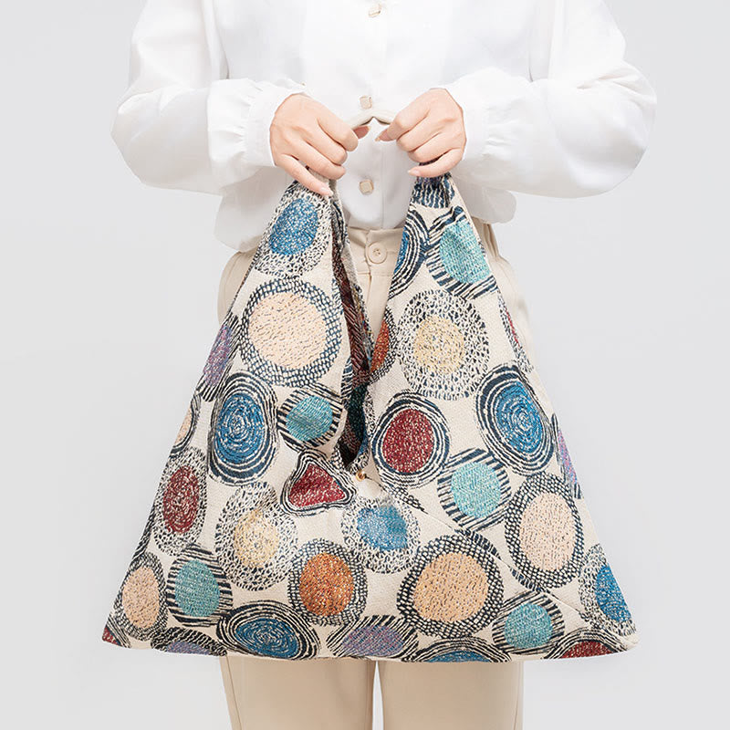 Sac à bandoulière triangulaire à imprimé léopard et fleurs de tigre géométriques