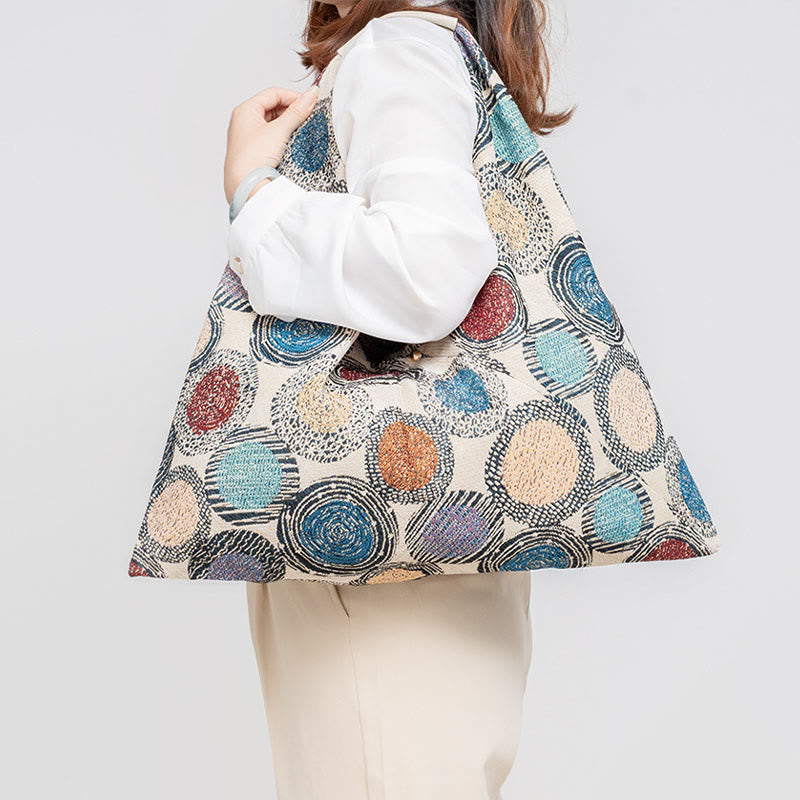 Sac à bandoulière triangulaire à imprimé léopard et fleurs de tigre géométriques