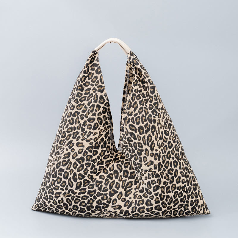 Sac à bandoulière triangulaire à imprimé léopard et fleurs de tigre géométriques