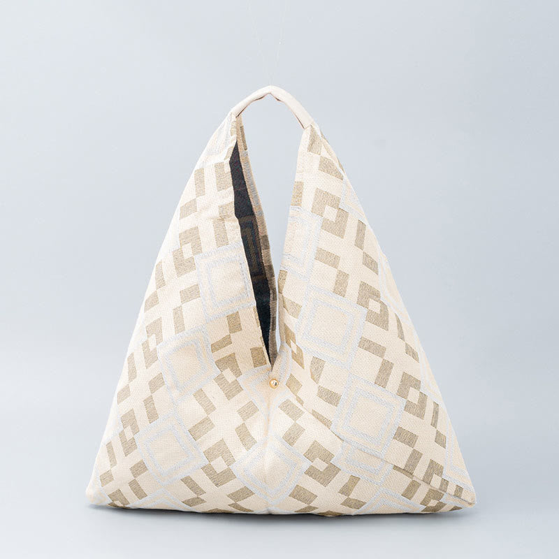 Sac à bandoulière triangulaire à imprimé léopard et fleurs de tigre géométriques