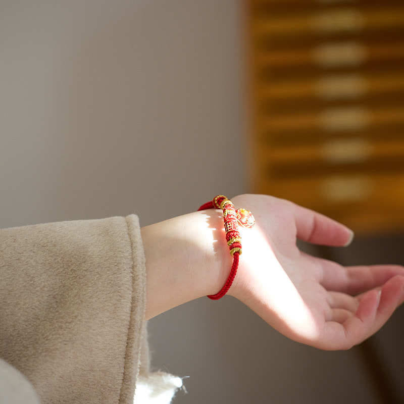 Bracelet Shi Lai Yun Zhuan en cuivre plaqué or et fil rouge 14-18 cm