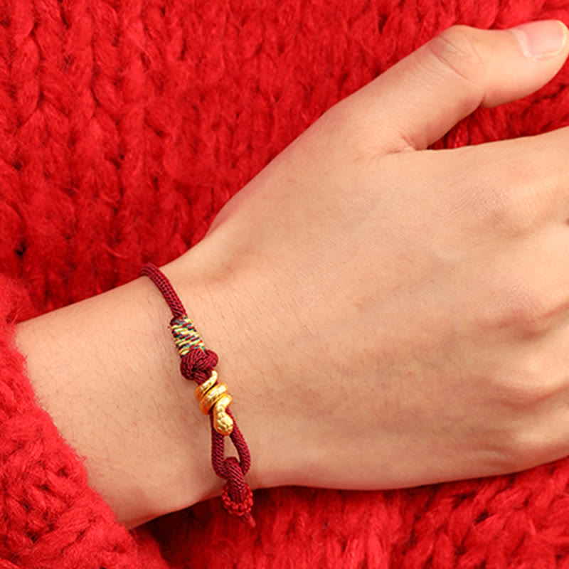 Bracelet de protection porte-bonheur en fil rouge serpent doré