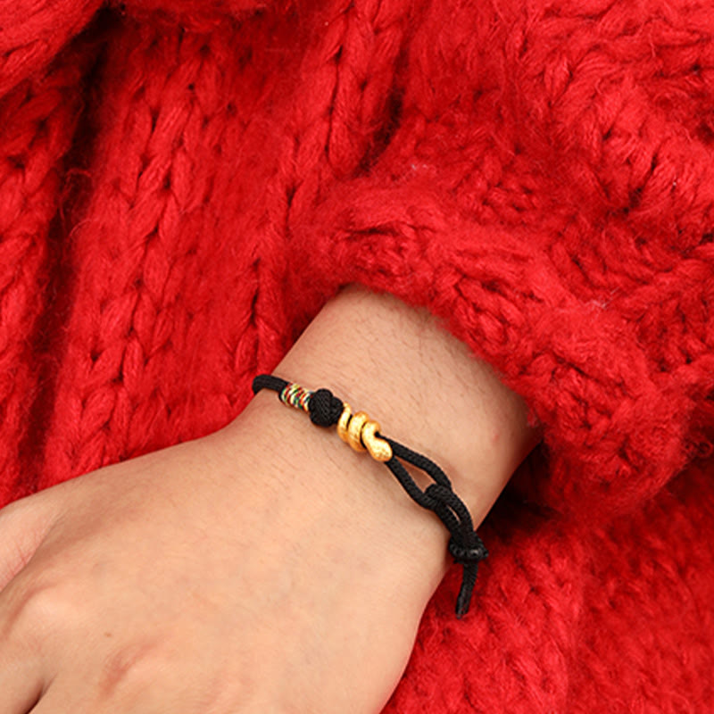Bracelet de protection porte-bonheur en fil rouge serpent doré
