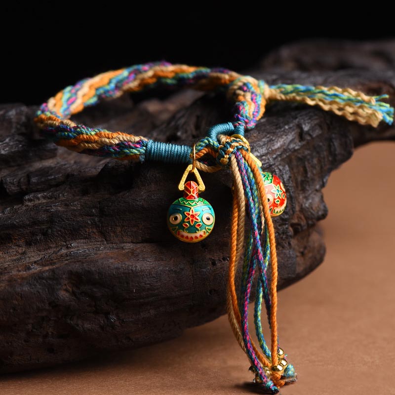 Bracelet porte-bonheur en or de la famille des Bêtes avaleuses | Cordon coloré