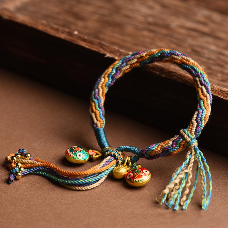 Bracelet porte-bonheur en or de la famille des Bêtes avaleuses | Cordon coloré