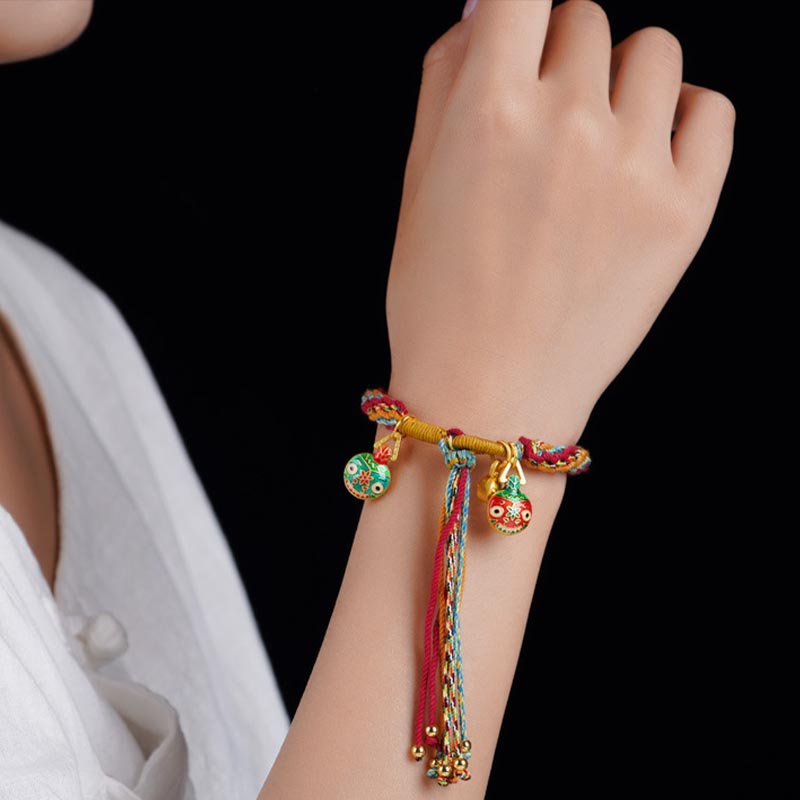 Bracelet porte-bonheur en or de la famille des Bêtes avaleuses | Cordon coloré