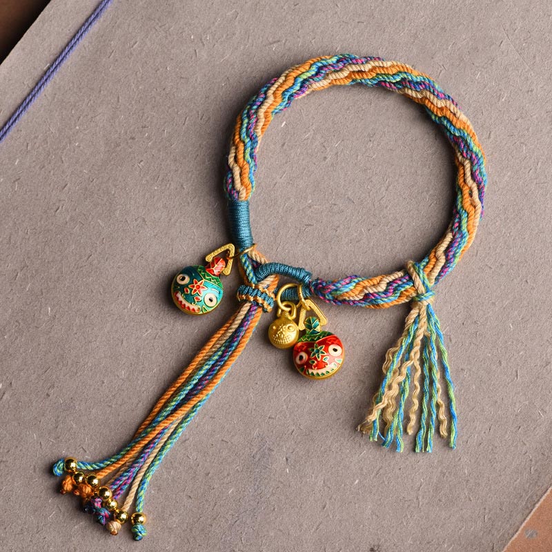 Bracelet porte-bonheur en or de la famille des Bêtes avaleuses | Cordon coloré