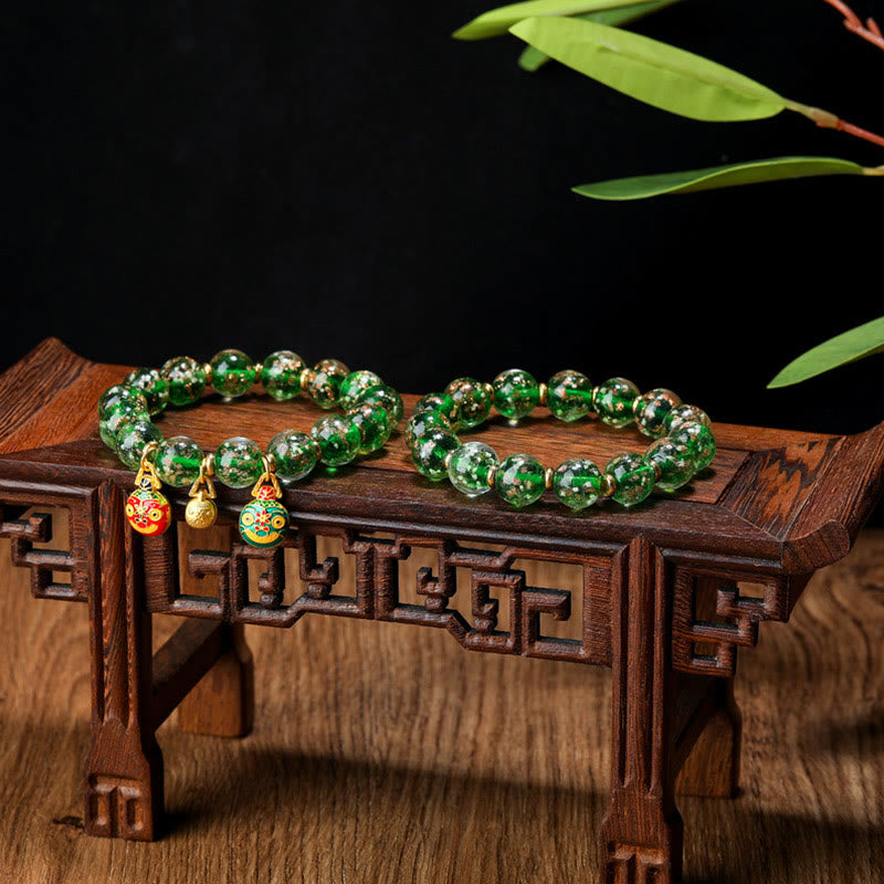 Bracelet en verre Liuli lumineux Bête avaleuse d'or 12 mm