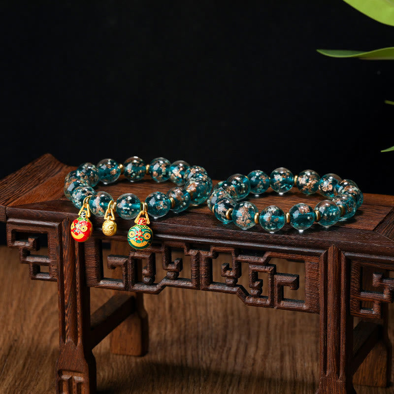 Bracelet en verre Liuli lumineux Bête avaleuse d'or 12 mm