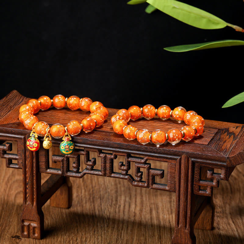 Bracelet en verre Liuli lumineux Bête avaleuse d'or 12 mm