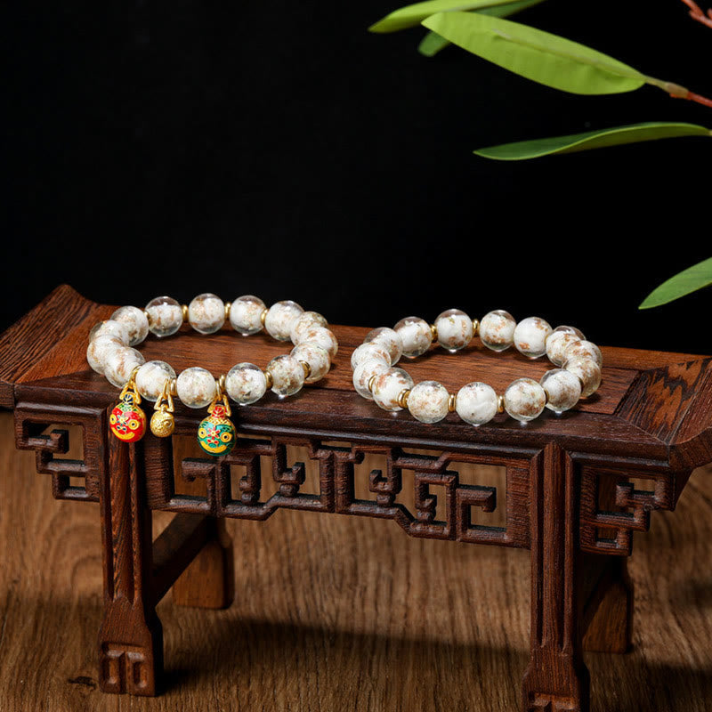 Bracelet en verre Liuli lumineux Bête avaleuse d'or 12 mm