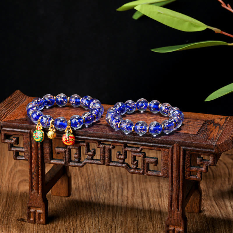 Bracelet en verre Liuli lumineux Bête avaleuse d'or 12 mm