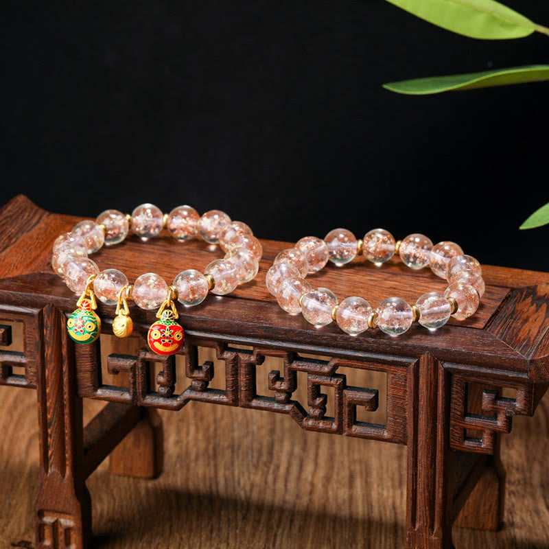 Bracelet en verre Liuli lumineux Bête avaleuse d'or 12 mm