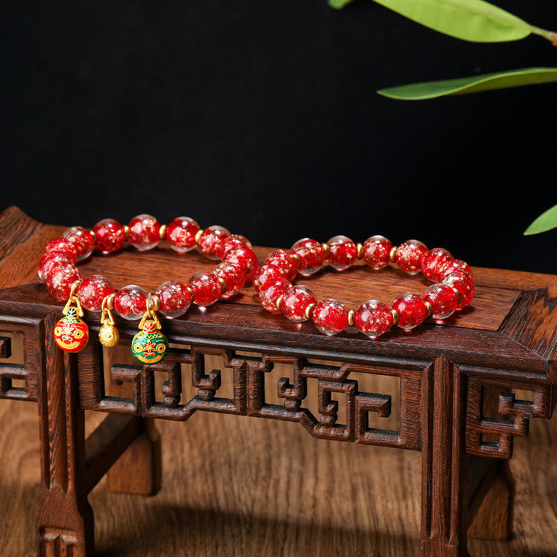 Bracelet en verre Liuli lumineux Bête avaleuse d'or 12 mm