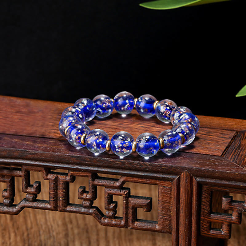 Bracelet en verre Liuli lumineux Bête avaleuse d'or 12 mm