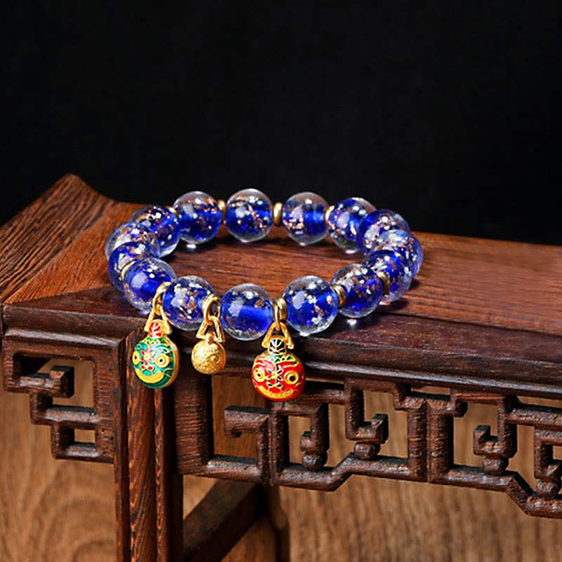 Bracelet en verre Liuli lumineux Bête avaleuse d'or 12 mm